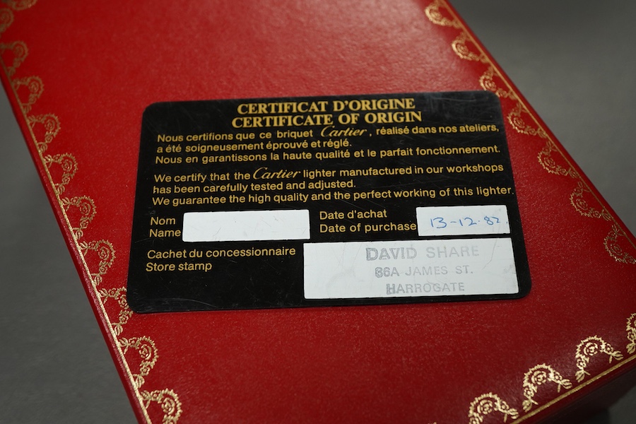 A cased Must de Cartier lighter, with certificate